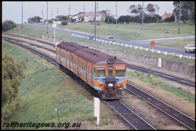 T07426
ADG/ADG Class railcar set, Up suburban passenger service, departing Mosman Park, searchlight signal, freight line between Leighton Yard and Cottesloe on right, ER line
