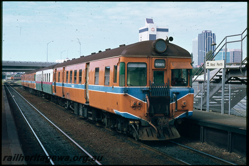 T07431
ADG Class 608 with ADA/ADG/ADA Class railcar set, Up suburban passenger service, West Perth, platform, footbridge, station nameboard, ER line
