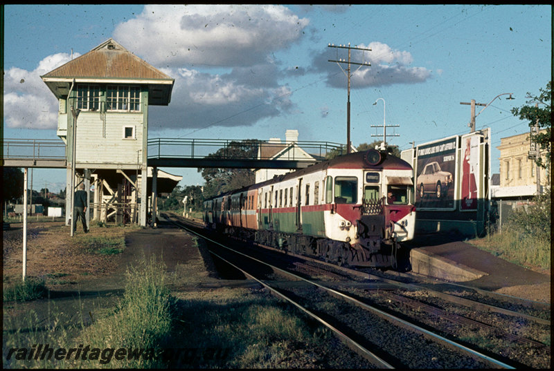 T07440
ADX/ADA/ADX/ADA Class railcar, Up suburban passenger service, Claremont, footbridge, platforms, station buildings, signal cabin, ER line
