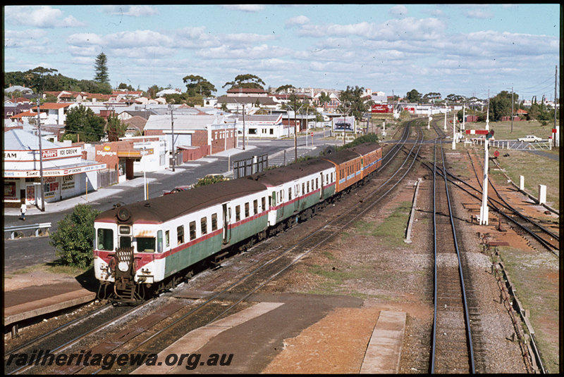 T07461
ADX/AYE/ADX/ADA Class railcar set, Up suburban set, departing Cottesloe, semaphore signals, platform, Jarrad Street level crossing, point rodding, ER line
