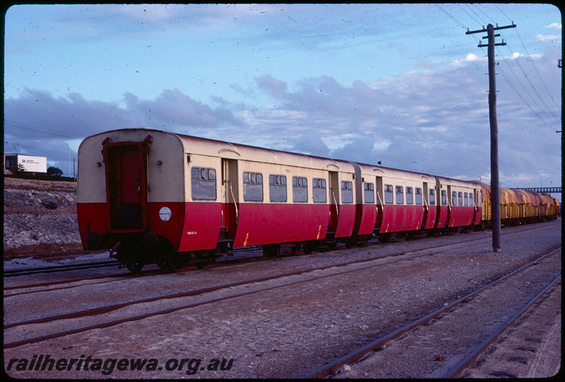 T07474
Ex-Tasmanian Government Railways SSD Class and two SS Class carriages purchased by Hotham Valley Railway coupled to rake of RBC Class open wagons, carriages recently arrived at Fremantle Port awaiting transfer to Pinjarra, Leighton Yard
