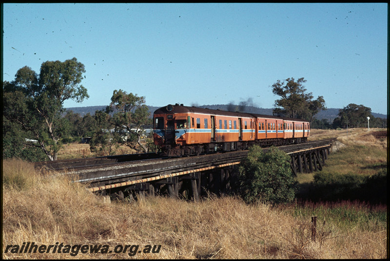 T07531
ADX/AYE/ADX Class railcar set, Up suburban passenger service, Canning River Bridge, timber trestle, between Gosnells and Stokely, SWR line
