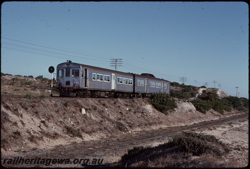 T07896
ADB Class 777 with ADK Class railcar, Down suburban passenger service, between Leighton and Victoria Street, bi-directional freight line between Leighton and Cottesloe in foreground, searchlight signal, ER line
