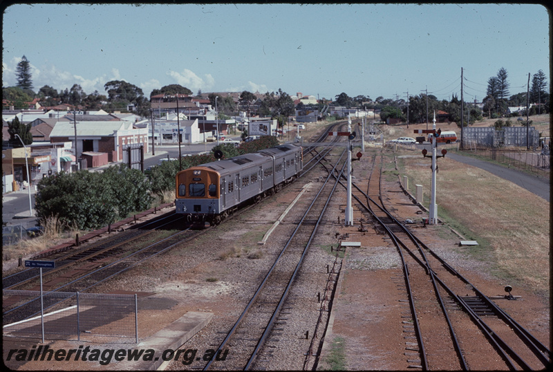 T07984
ADC/ADL Class railcar set, Down suburban passenger service, Cottesloe, point rodding, semaphore signals, searchlight signal, Jarrad Street level crossing, ER line
