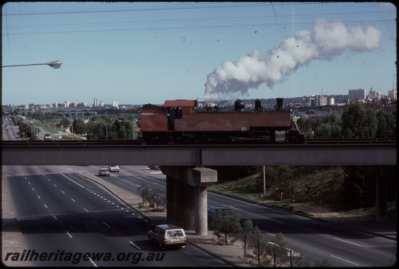 T08059
DD Class 592, in undercoat, Down light engine steam trial bound for Armadale, Great Eastern Highway Overpass, Rivervale, SWR line
