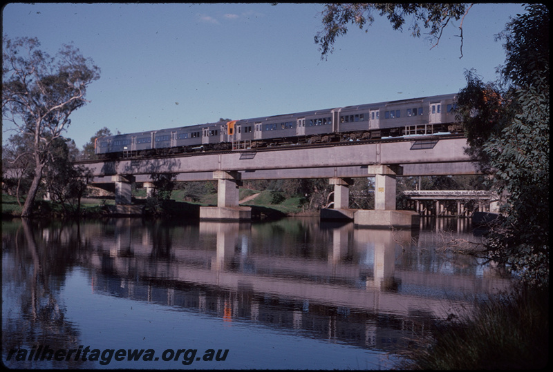 T08069
Four-car ADL/ADC Class railcar set, Down suburban passenger service, Swan River Bridge, steel girder, concrete pylon, Guildford, ER line
