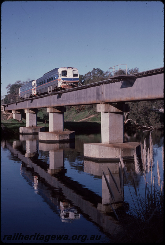 T08072
Two-car Prospector railcar set, Up service, Swan River Bridge, steel girder, concrete pylon, Guildford, ER line
