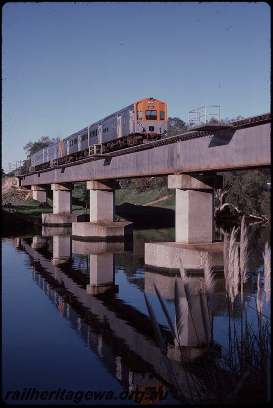 T08073
Four-car ADL/ADC Class railcar set, Up suburban passenger service, Swan River Bridge, steel girder, concrete pylon, Guildford, ER line
