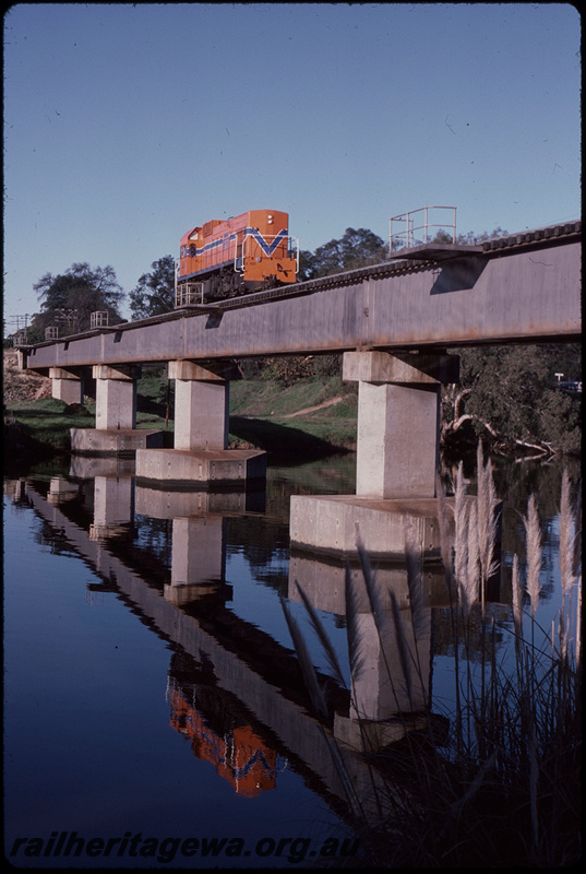 T08074
A Class 1511, Up light engine movement, Swan River Bridge, steel girder, concrete pylon, Guildford, ER line
