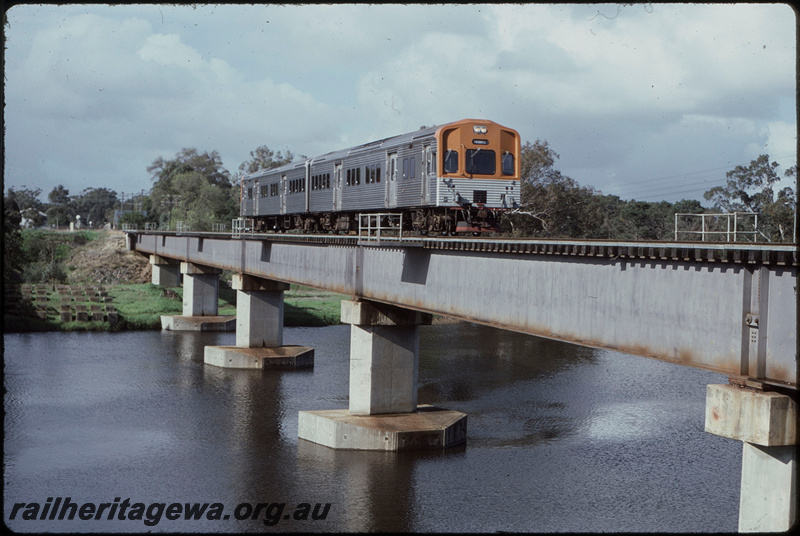 T08079
ADL/ADC Class railcar set, Up suburban passenger service, Swan River Bridge, steel girder, concrete pylon, Guildford, ER line
