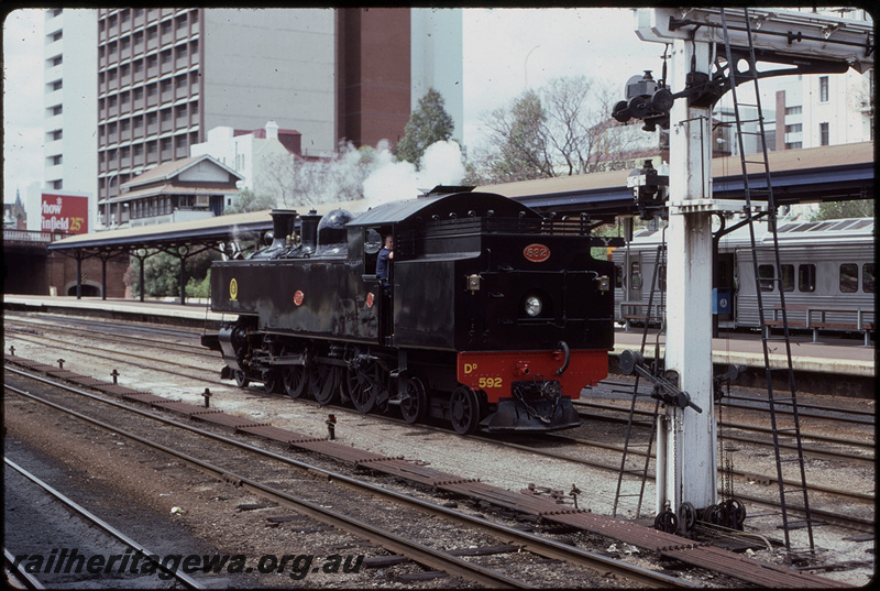 T08110
DD Class 592, running around ARHS passenger special, one of four steam shuttles run between Fremantle and Perth for Parliament Week celebrations, Barrack Street Bridge, Perth Box C signal cabin, semaphore bracket signal, point rodding, signal wires, ADC/ADL Class railcar in Platform 3, City Station, Perth, ER line
