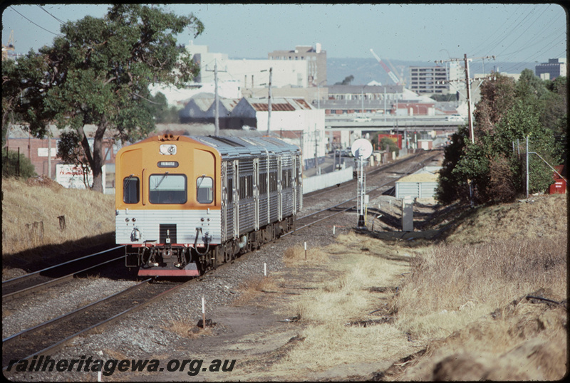 T08163
ADL/ADC Class railcar set, Up suburban passenger service, between West Perth and West Leederville, new City West station platforms under construction, searchlight signal, ER line
