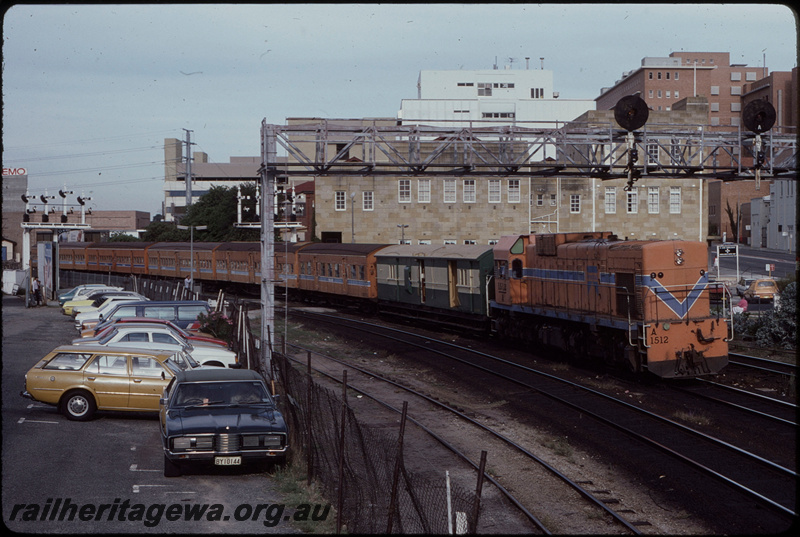 T08175
A Class 1512, Up suburban passenger service, ZJ Class brakevan in consist, approaching City Station, Pier Street pedestrian crossing, searchlight signal gantry, semaphore bracket signals, Perth, ER line
