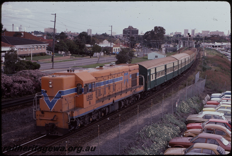 T08251
A Class 1502, Down suburban passenger service, approaching Mount Lawley, searchlight signal gantry, ER line
