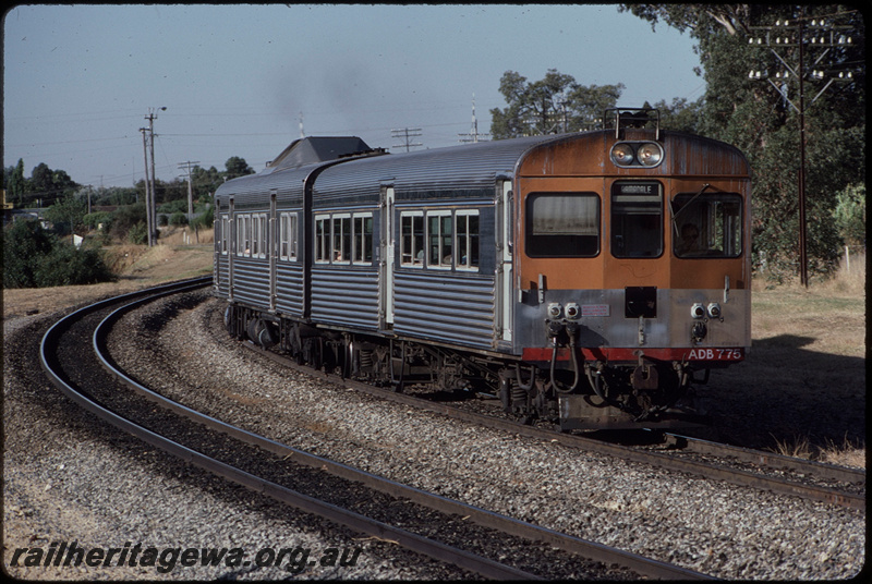 T08365
ADB Class 775 with ADK Class railcar, Down suburban passenger service, departing Stokley, SWR line
