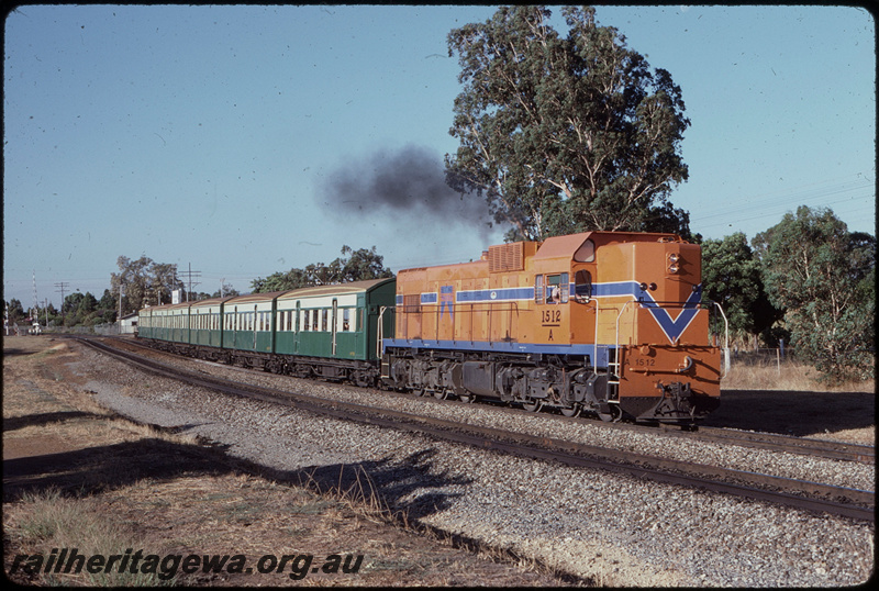 T08405
A Class 1512, Down suburban passenger service, departing Stokley, Albany Highway level crossing, SWR line
