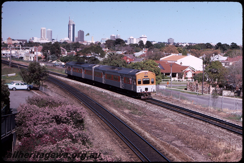 T08473
ADC/ADL Class railcar set, Down suburban passenger service, Mount Lawley, searchlight signal gantry, ER line
