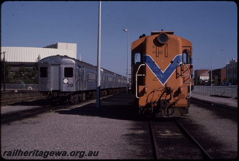 T08481
C Class 1702, stabled in carriage sidings, Perth Yard, Queensland Railways (QR) SXV Class carriage, ER line
