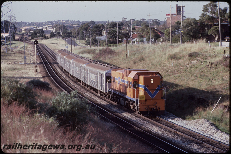 T08492
A Class 1512, Down suburban passenger service, 5-car set of hired Queensland Railways (QR) SXV and SX Class carriages, between Rivervale and Victoria Park, searchlight signals, SWR line
