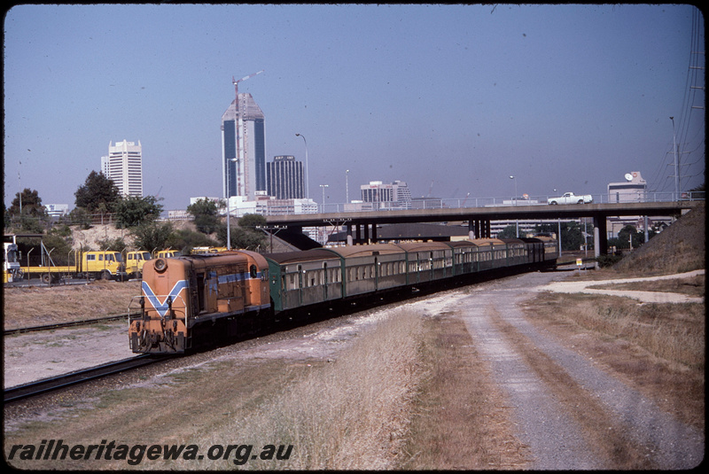 T08533
F Class 40, Down Hotham Valley hired special to Dwellingup, Westrail road services depot, East Parade overpass, East Perth, SWR line
