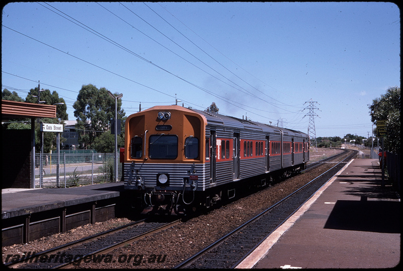 T08609
ADL Class 803 and ADC Class 853, Up suburban passenger service, departing Oats Street, platform, shelter, station nameboard, SWR line
