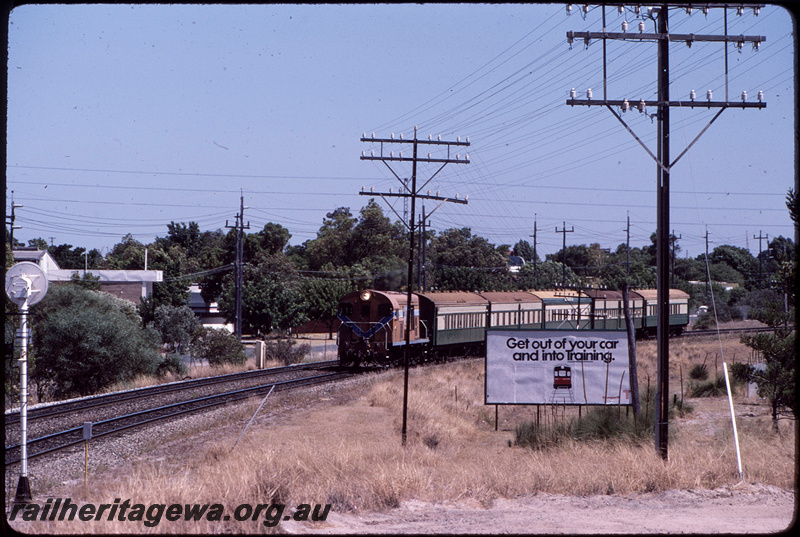T08617
F Class 43, Down Hotham Valley Railway hired passenger special to Dwellingup, between Oats Street and Welshpool, searchlight signal, Transperth advert on billboard with slogan 